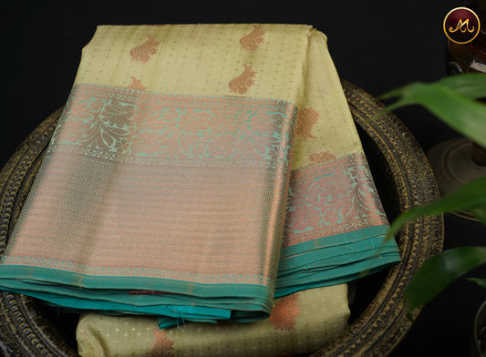 Kanchipuram Semi-Silk Sarees in Pista Green  with Peacock Blue Combination with Emboss work allover the Body  and copper zari border and Rich Pallu