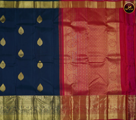 Kanchivaram Handloom Pure Silk in Butta Pattern in Peacock Blue  And Rani Pink combination with Gold Long Zari  Border and Rich Pallu