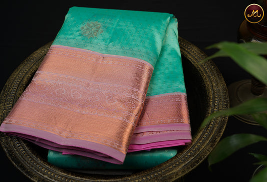 Kanchipuram Semi-Silk Sarees in Aqua Green with Baby Pink Combination with Emboss work allover the Body  and copper zari border and Rich Pallu