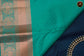 Kanchipuram Semi-Silk Sarees in Peacock Green with Rama Green Combination with Emboss work allover the Body  and copper zari border and Rich Pallu
