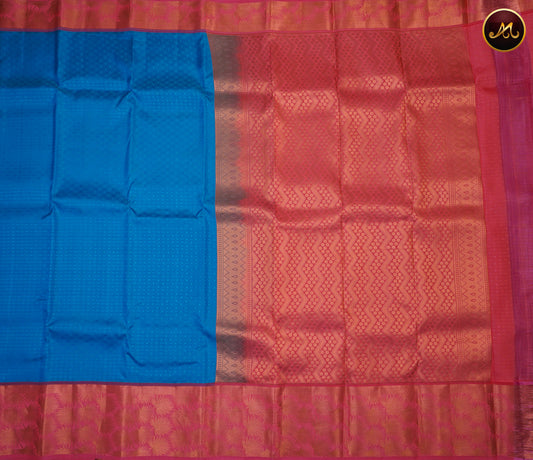 Kanchipuram Semi-Silk Sarees in Ananda Blue with Baby Pink Combination with Emboss work allover the Body  and copper zari border and Rich Pallu