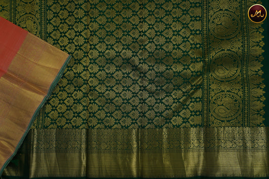 Kanchivaram Handloom Pure Silk in Butta Pattern in Peach  And Bottle Green combination with Gold Zari  Border and Rich Pallu