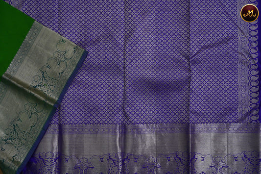 Kanchivaram Handloom Pure Silk in Butta Pattern in Green  And Dark Blue combination with Silver Zari  Border and Rich Pallu