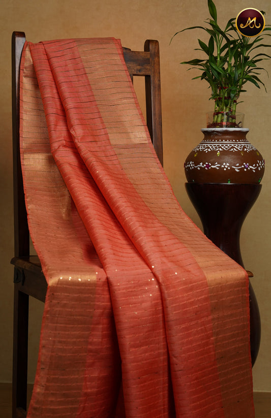 Bhagelpuri Cotton Saree in allself orange colour with jute stripes and sequence pallu