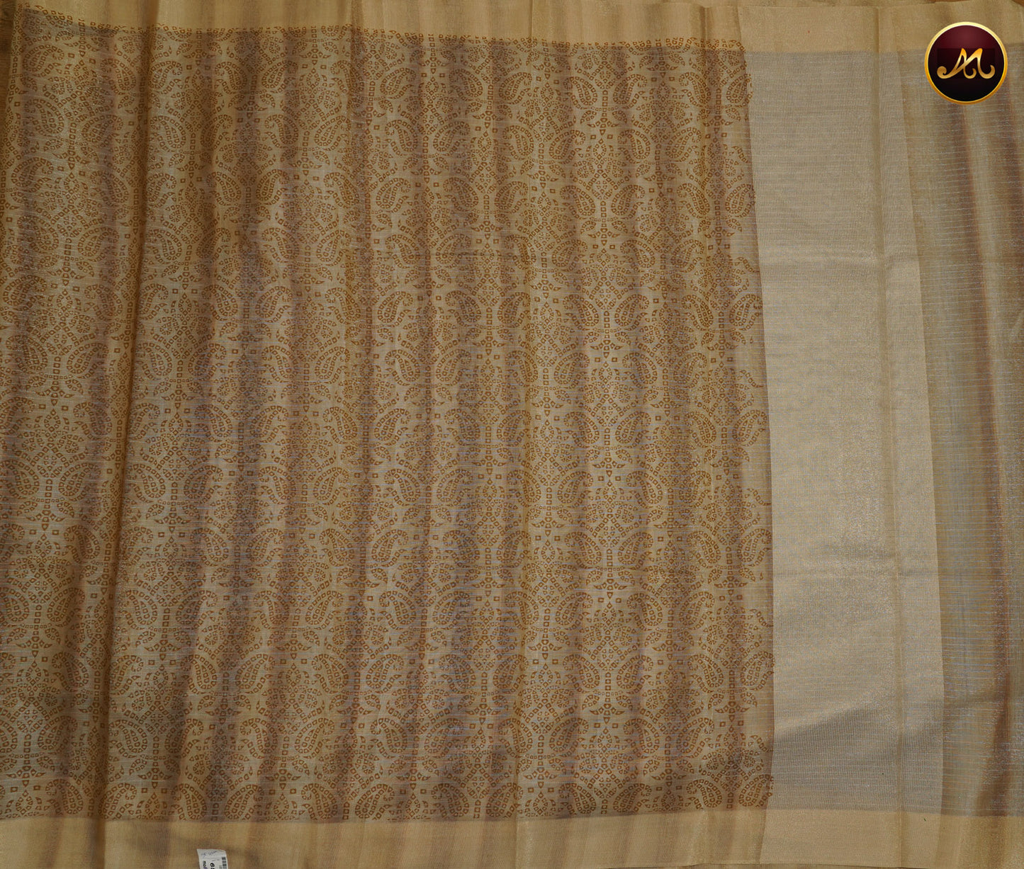 Gold tissue saree in with light brown bandini prints and goldzari border