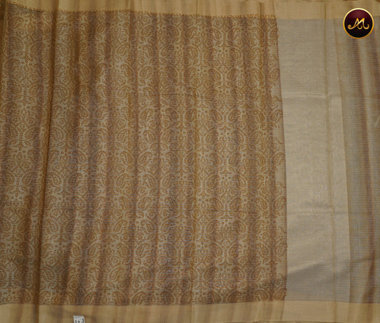 Gold tissue saree in with light brown bandini prints and goldzari border