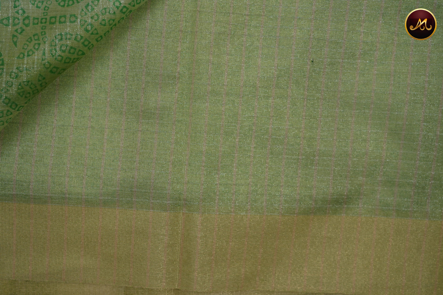 Gold tissue saree in with parrot green bandini prints and goldzari border