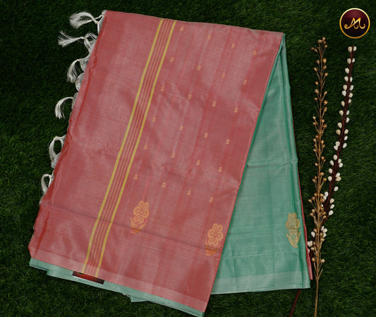 Banana silk saree in sea green and light pink combination with thread work motifs