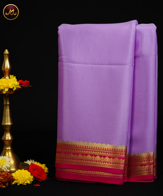 Mysore Crepe Silk saree with KSIC finish in Lavender and Rani Pink combination with Golden zari Border.