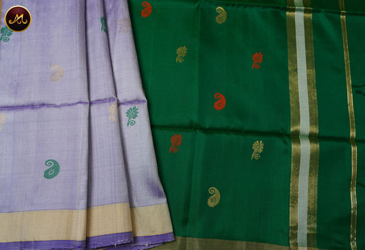 Raw Silk Saree in Lavender and Bottle Green combination with buttas and soft Silk pallu
