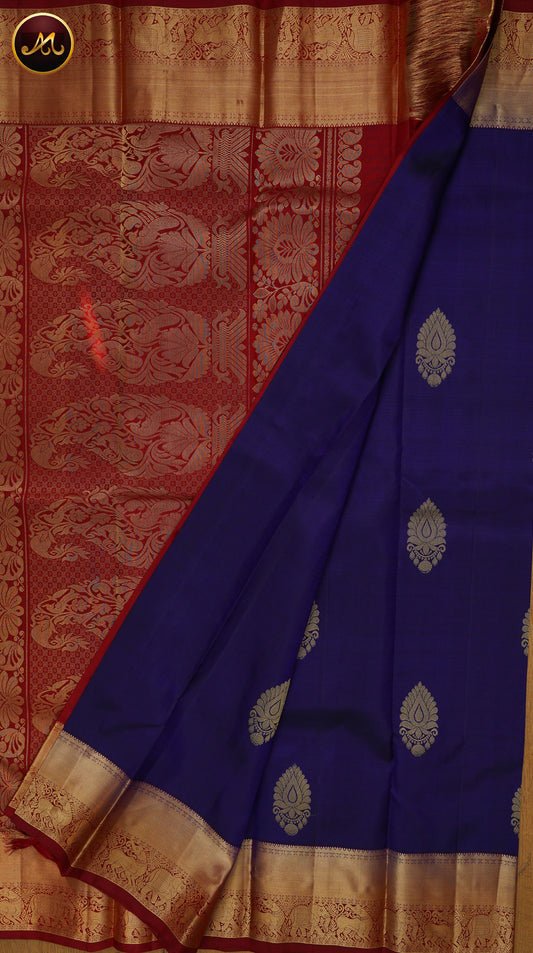 Kanchivaram Pure Silk in Royal blue and Maroon red combination and  Golden Zari Korvai Border