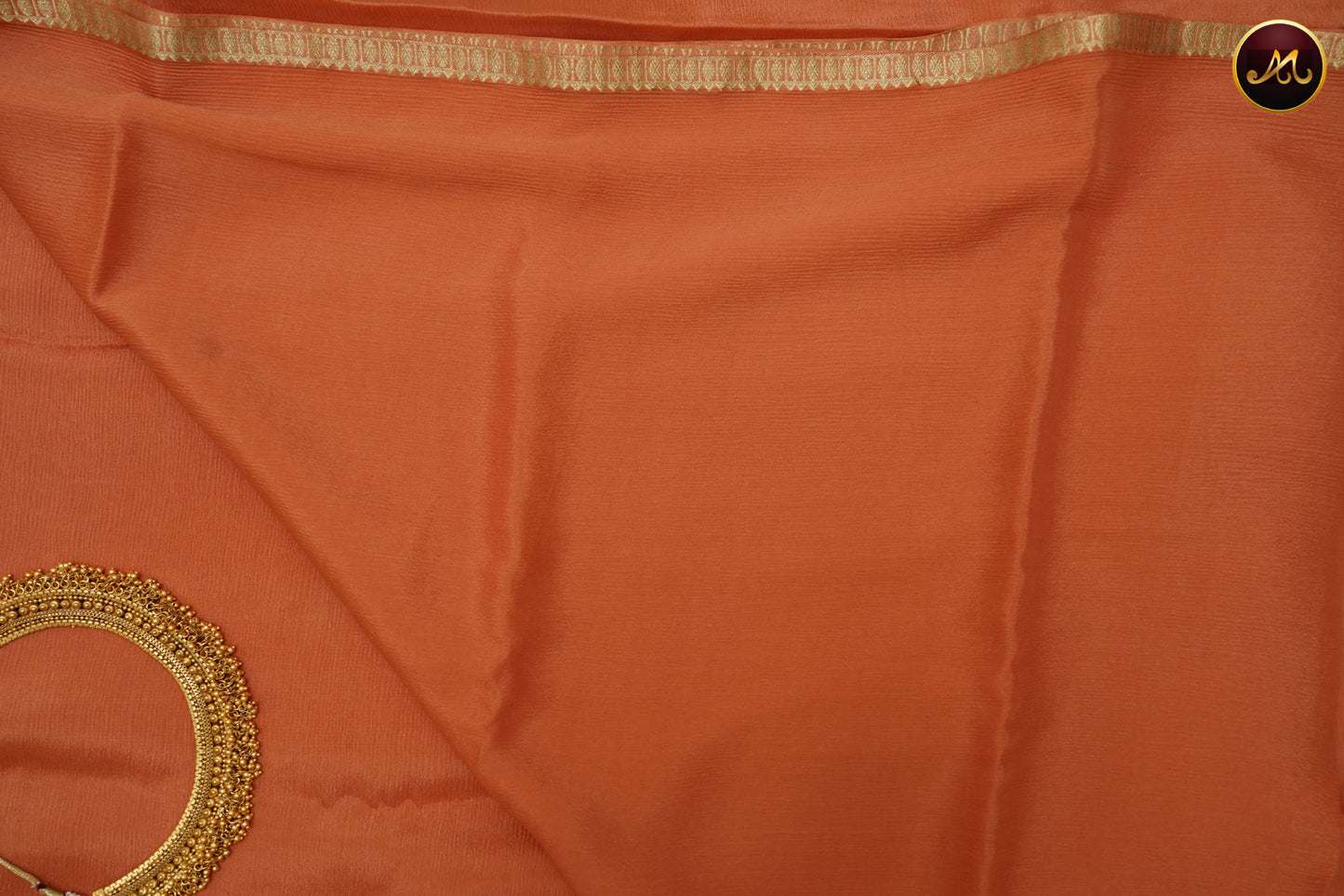 Mysore Double wrinkle Crepe Silk saree  in allself Peach colour small  Gold zari Border 350gm
