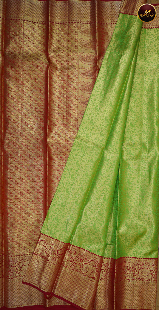 Kanchivaram Pure Silk  Tissue Saree in Parrot Green and Red colour combination with brocade work, long and short border in Gold zari and rich pallu