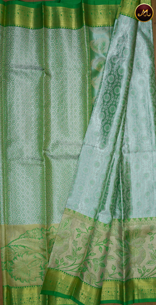 Kanchivaram Pure Silk Saree in light green with leaf green combination, long and short border in gold zari and rich pallu