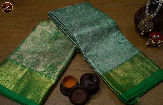 Kanchivaram Pure Silk Saree in light green with leaf green combination, long and short border in gold zari and rich pallu