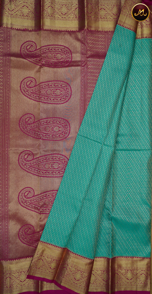 Kanchivaram Pure Silk Saree in Rama Green and Rani Pink combination with brocade work, gold zari border and rich pallu