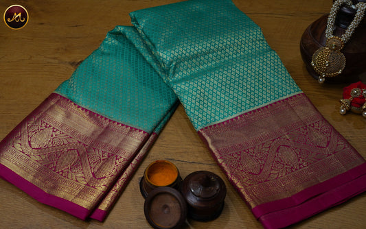 Kanchivaram Pure Silk Saree in Rama Green and Rani Pink combination with brocade work, gold zari border and rich pallu