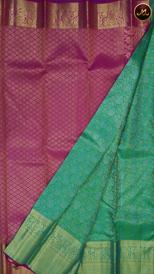 Kanchivaram Pure Silk Saree in rama green and pink combination, brocade work, long and short border in gold zari and rich pallu