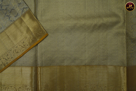 Kanchivaram Pure Silk Tissue Saree in grey and feni greek combination with emboss work, gold zari border and rich pallu