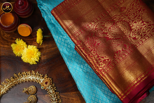 Kanchivaram Pure Silk Saree in skyblue and red combination with brocade work, korvai long and short border in gold zari and rich pallu