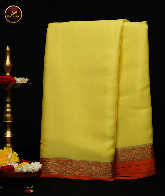 Mysore Crepe Silk saree in Lemon Yellow and Orange Colour combination with Gold zari  Border and simple pallu