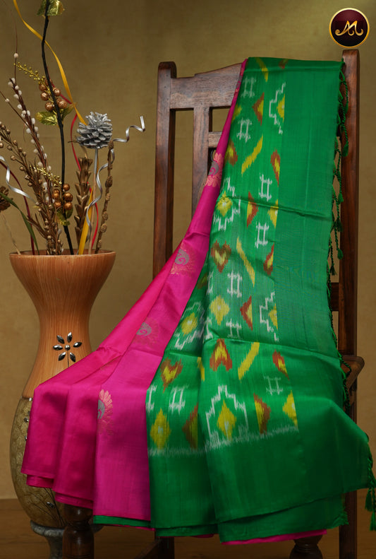 Handloom Soft silk Saree in Rani Pink and Bottle green colour combination with gold and meena butta allover the body and Ikat Pallu