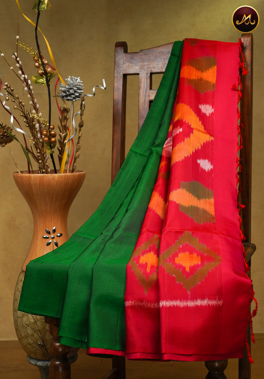 Handloom Soft silk Saree in Bottle Green and Cherry Red colour combination with gold and meena butta allover the body and Ikat Pallu