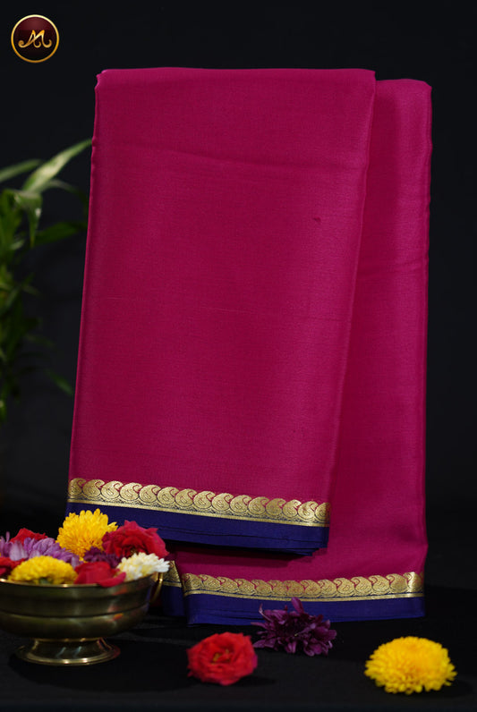 Mysore Crepe (Silk) saree in Rani Pink and Bott;le Green  combination with Gold zari Border and Simple pallu.