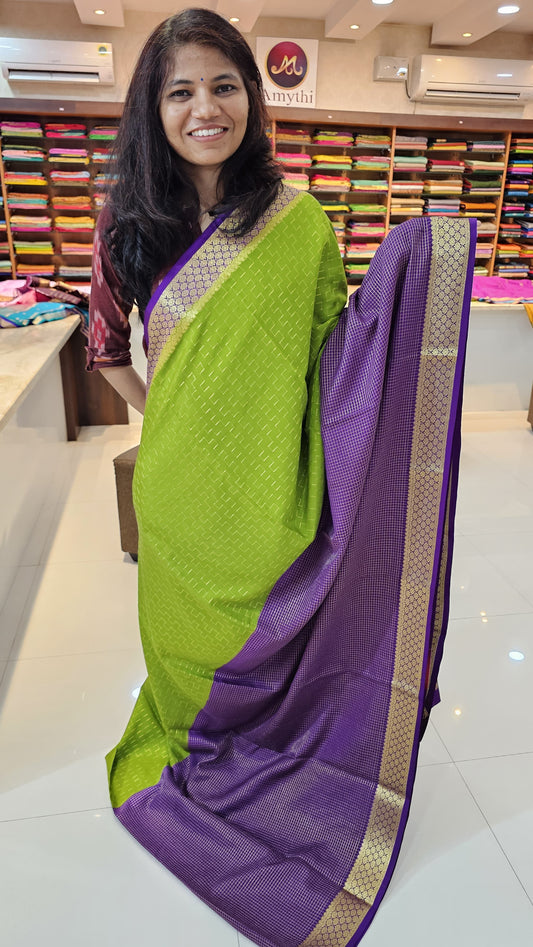Mysore crepe silk saree with KSIC Finish in  green with purple in half and half checks pattern
