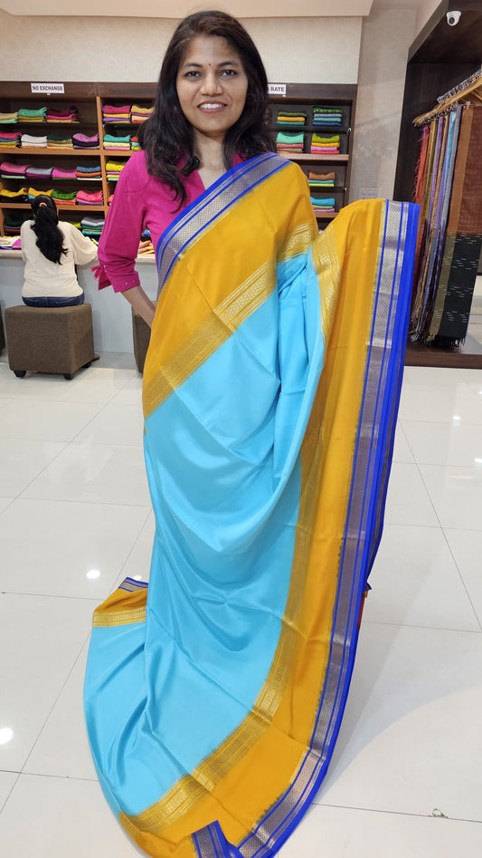 Mysore crepe silk saree with KSIC Finish in ice blue with mango yelow in bentex border pattern