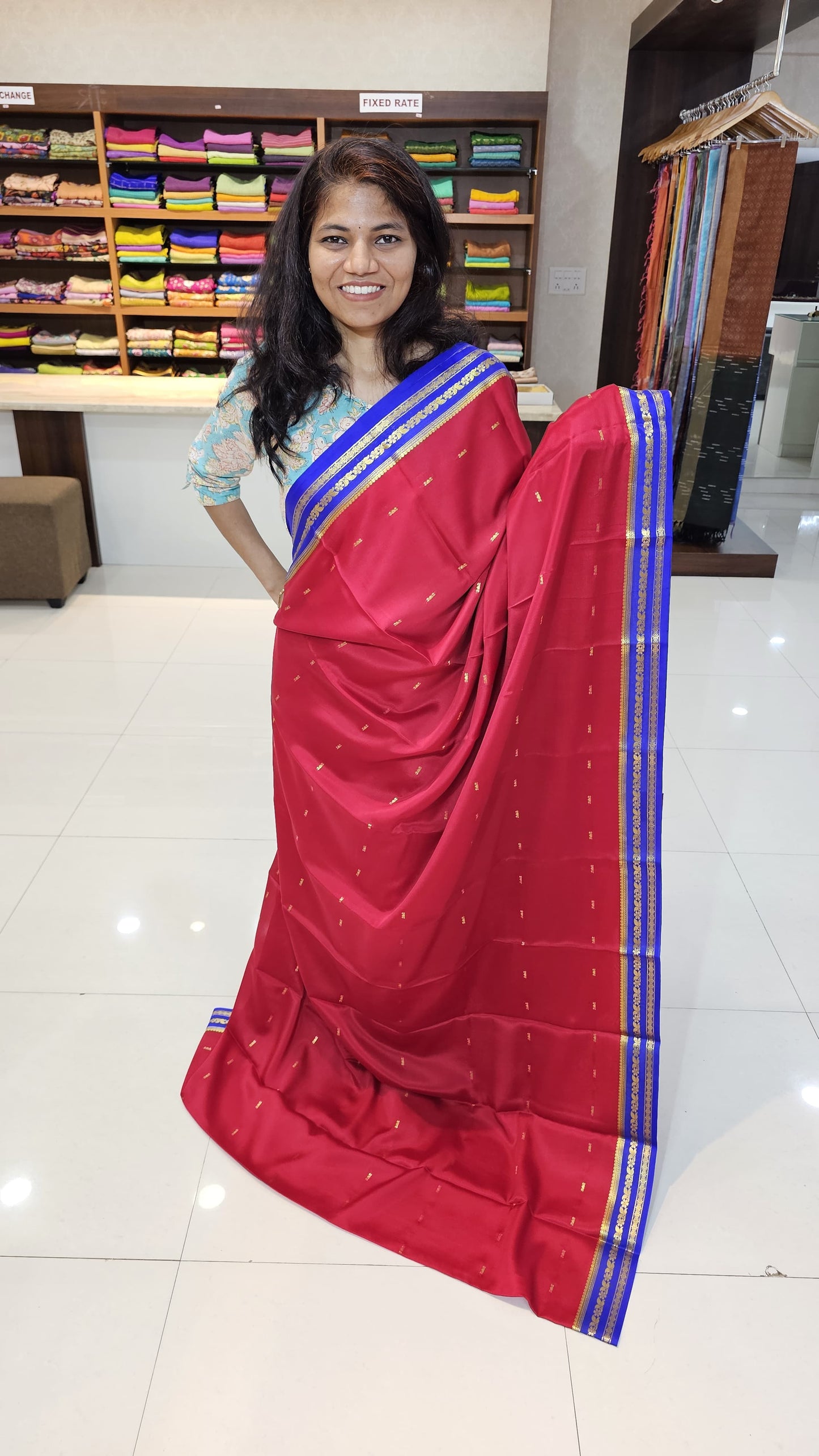 Mysore crepe silk saree with KSIC Finish in red with blue in small zari motifs pattern