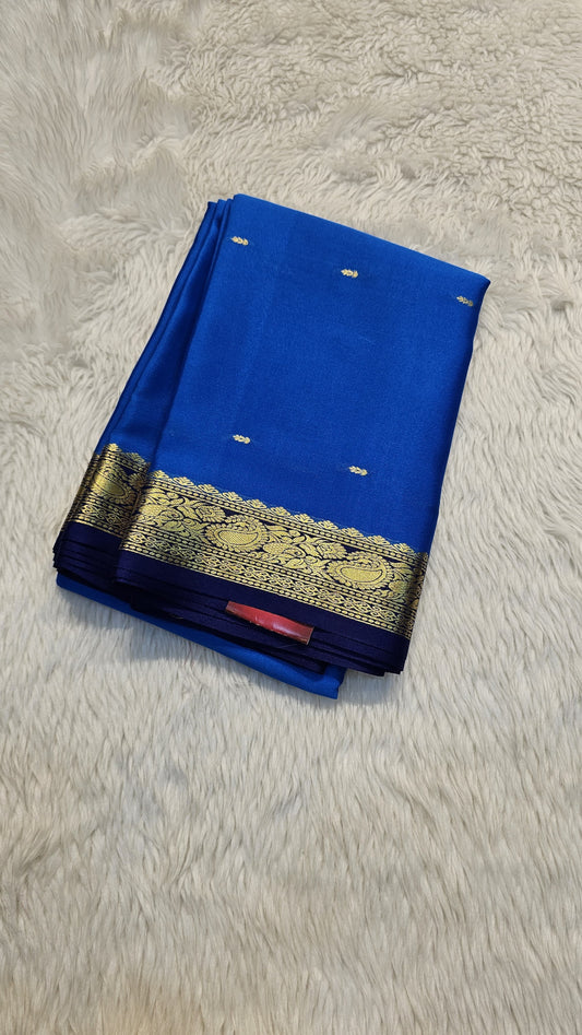 Mysore crepe silk saree with KSIC Finish in ananada Blue with Navy Blue in small zari motifs pattern