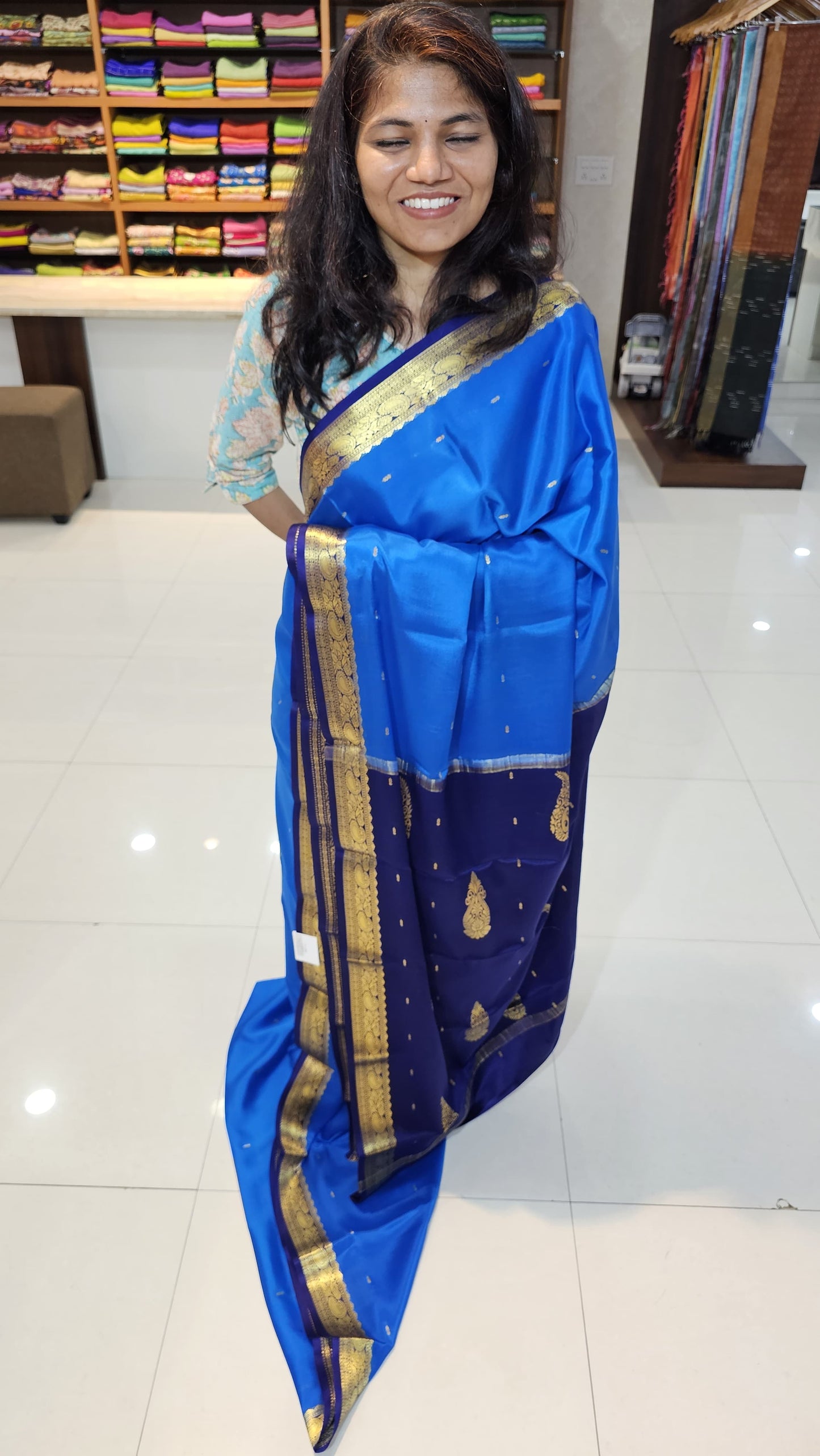Mysore crepe silk saree with KSIC Finish in ananada Blue with Navy Blue in small zari motifs pattern