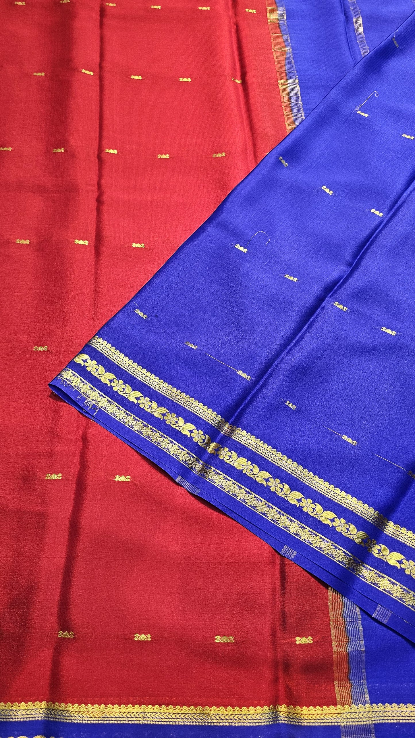 Mysore crepe silk saree with KSIC Finish in red with blue in small zari motifs pattern