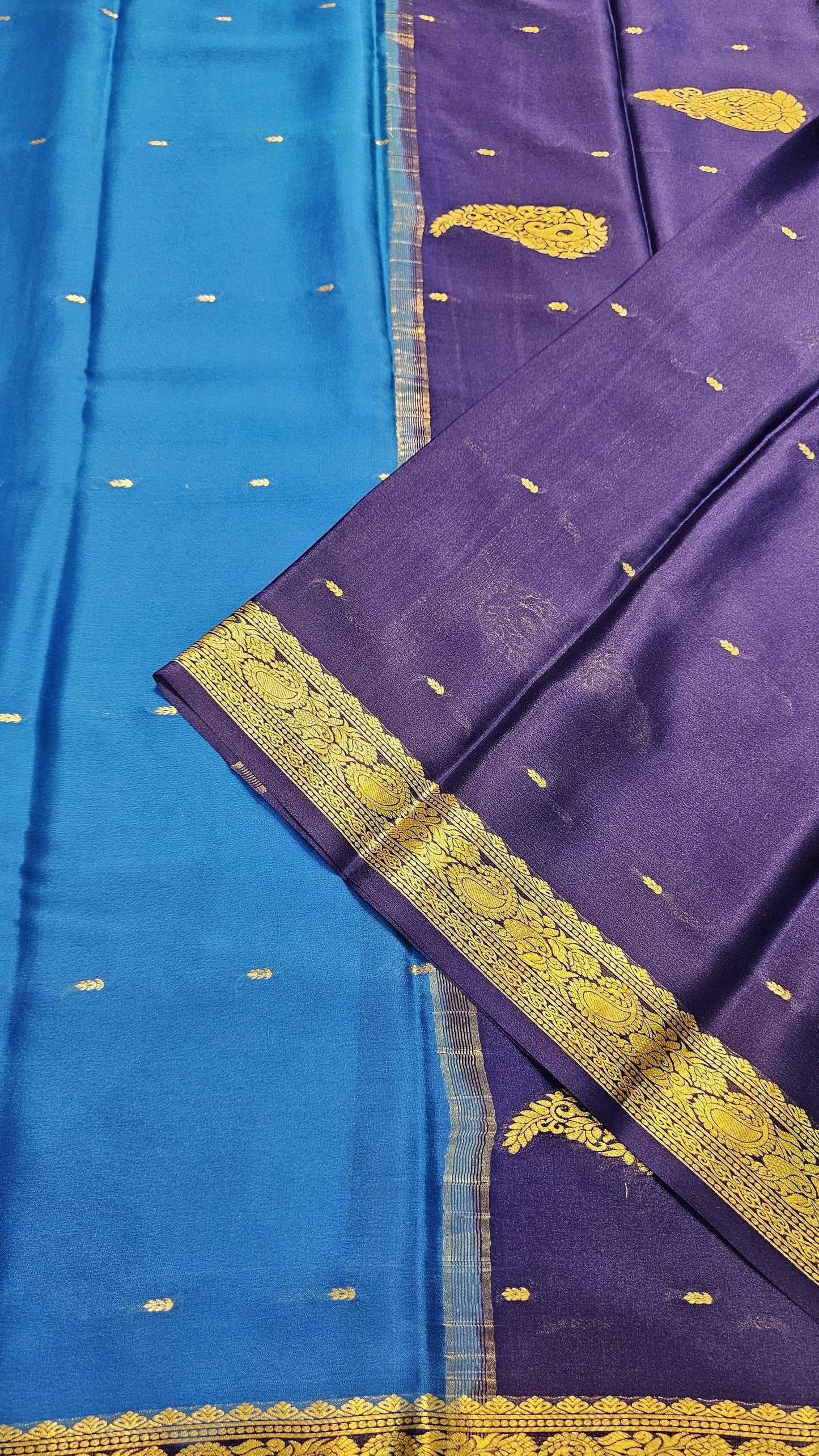 Mysore crepe silk saree with KSIC Finish in ananada Blue with Navy Blue in small zari motifs pattern