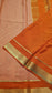 Mysore crepe silk saree with KSIC Finish in peach with orange in allover buttas pattern