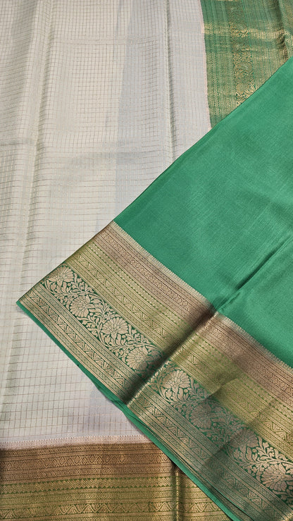 Mysore crepe silk saree with KSIC Finish in pista with leaf green checks pattern in kanchi border