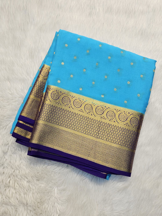 Mysore crepe silk saree with KSIC Finish in sky blue with purple in allover zari buttas pattern