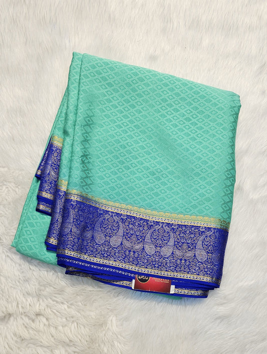 Mysore crepe silk saree with KSIC Finish in rama green with royal blue in mango motifis border