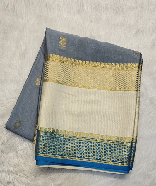 Mysore crepe silk saree with KSIC Finish in grey with half white in allover zari buttas pattern