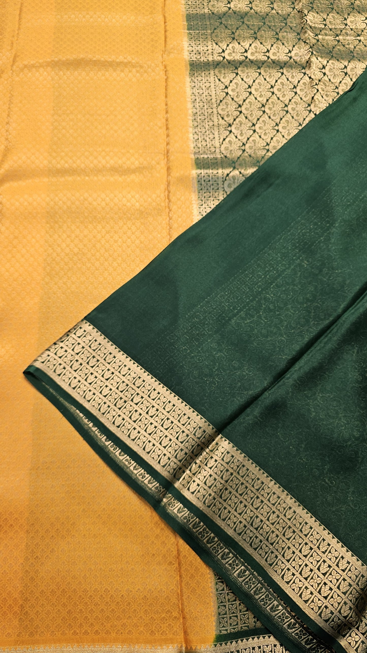 Mysore crepe silk saree with KSIC Finish in mango yellow, with green in brocade zari pattern