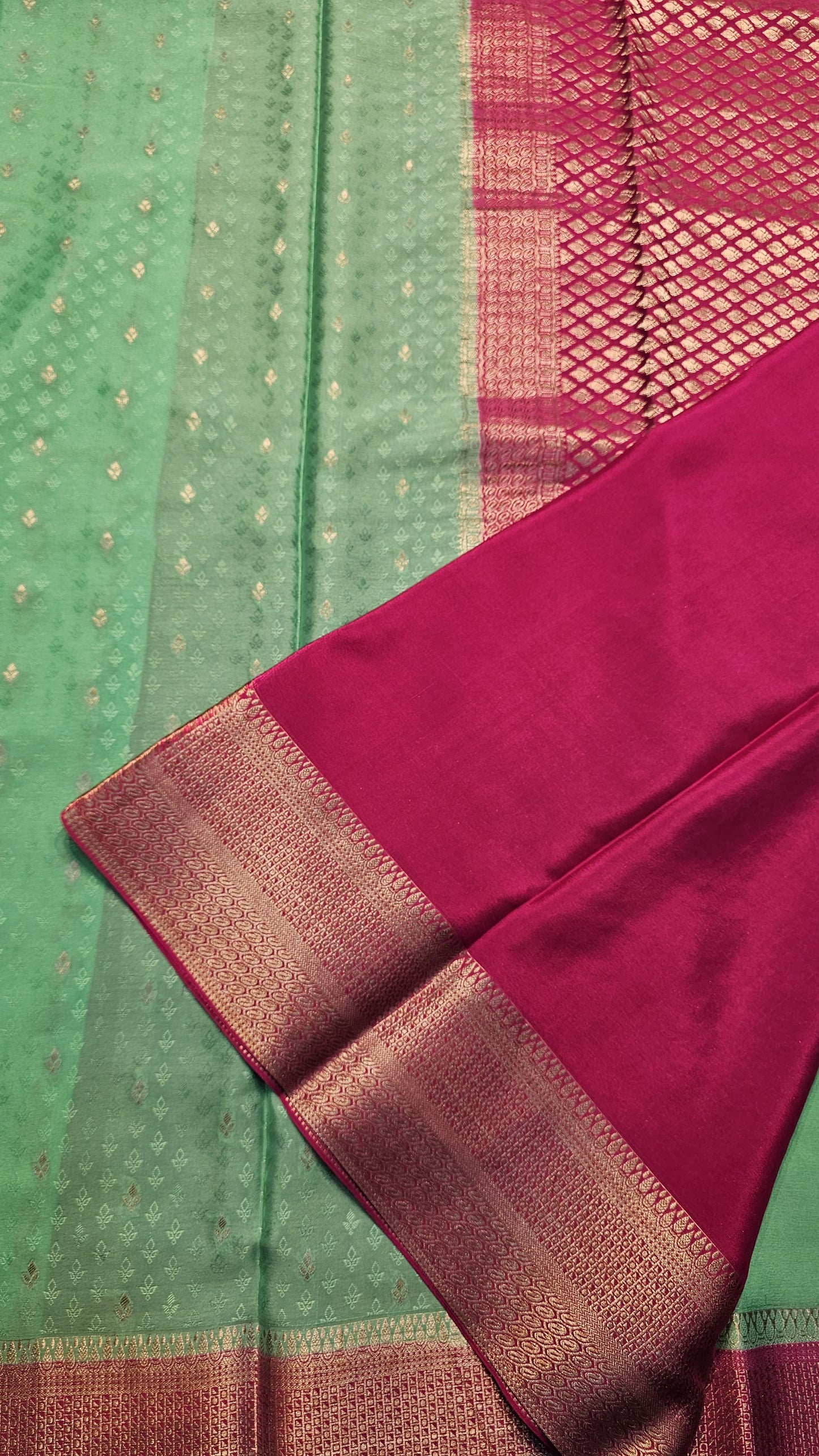 Mysore crepe silk saree with KSIC Finish in distemper green with rani pink in allover zari buttas pattern