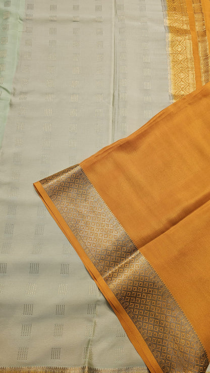 Mysore crepe silk saree with KSIC Finish indistemper green with mango yellow in checks pattern