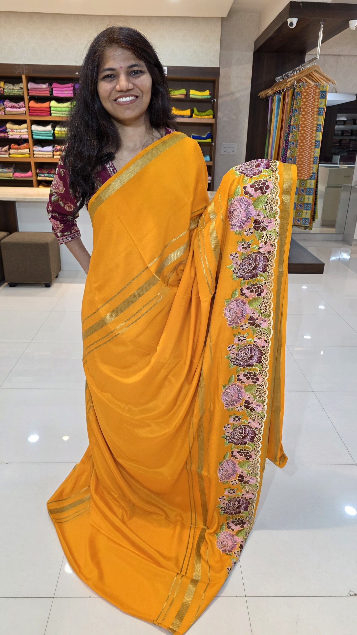 Mysore crepe silk saree with KSIC Finish in orange self in one side cutwork pattern