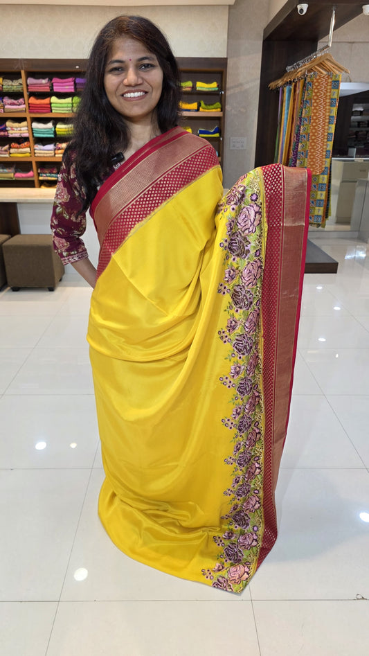 Mysore crepe silk saree with KSIC Finish in yellow with red in one side cutwork pattern