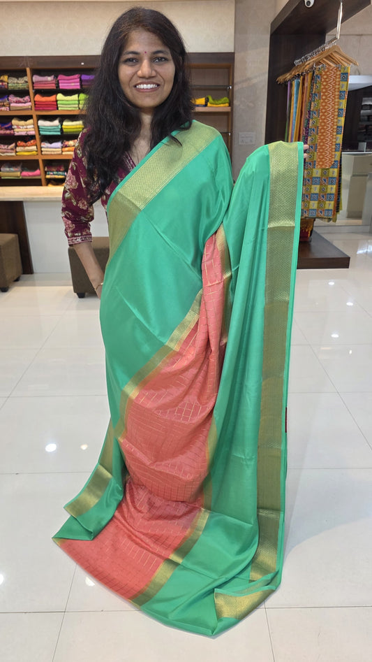 Mysore crepe silk saree with KSIC Finish in rama green with peach pink, in middle checks pattern
