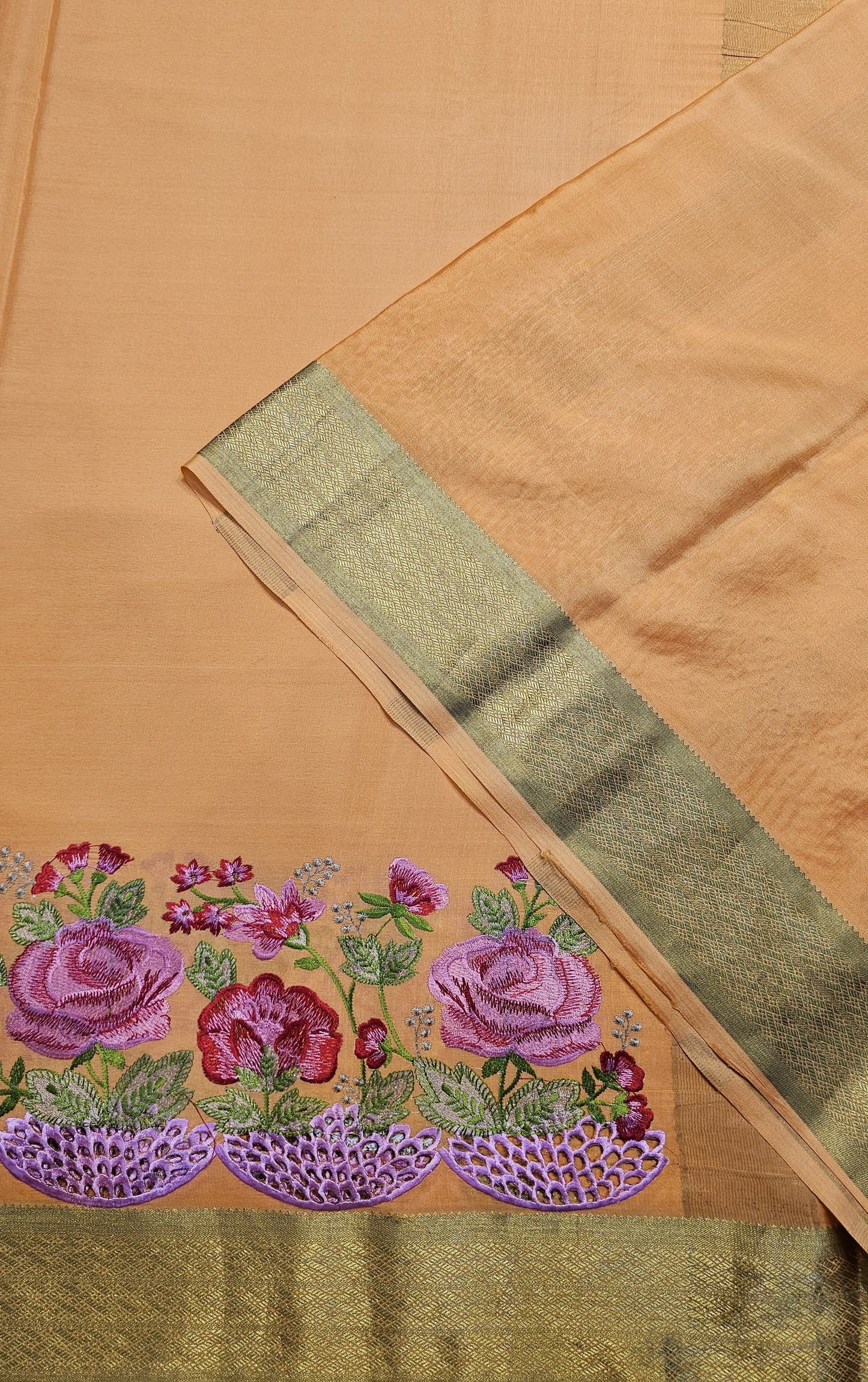 Mysore crepe silk saree with KSIC Finish in light peach in one side cutwork pattern
