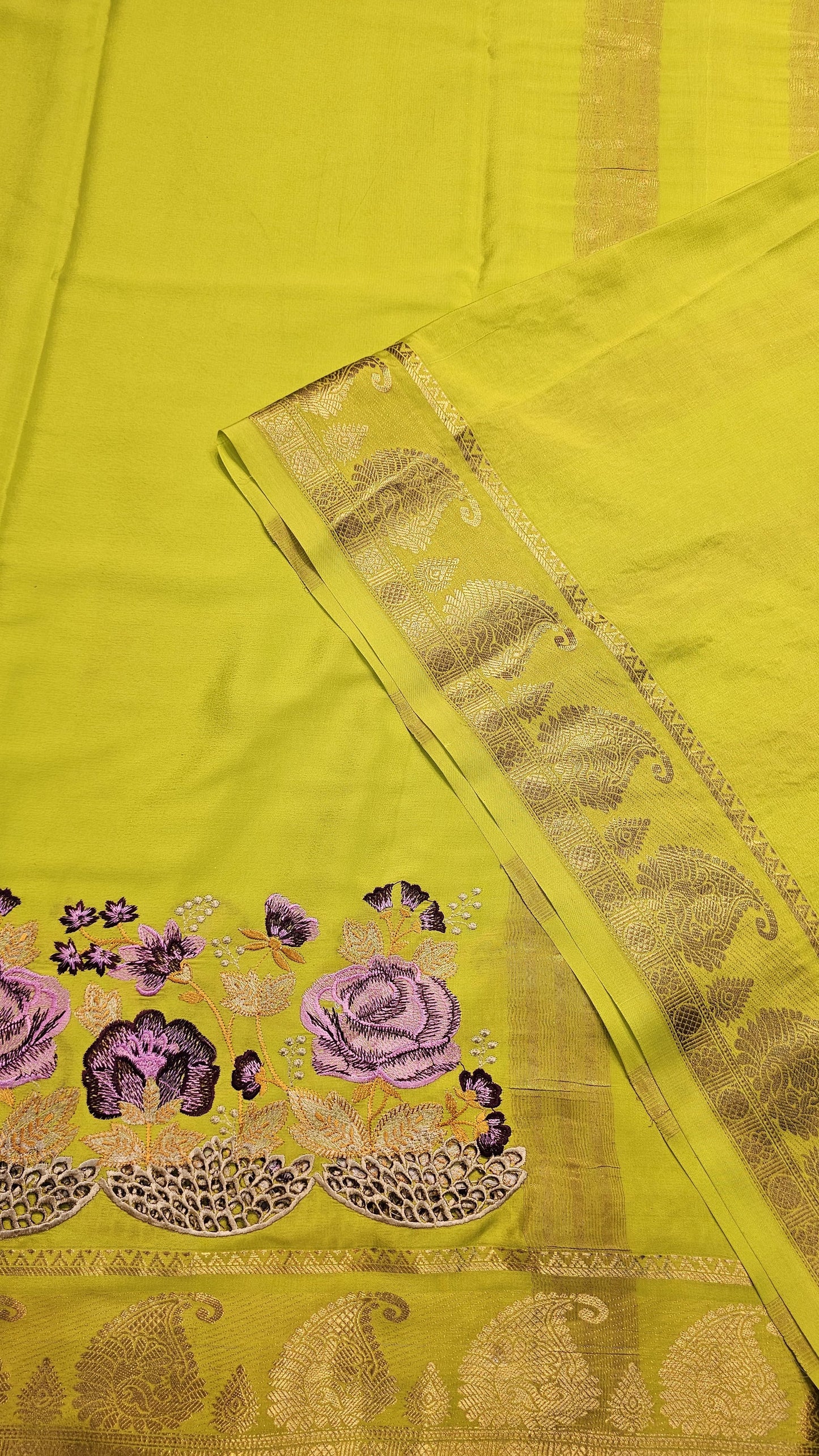 Mysore crepe silk saree with KSIC Finish in lemon green self in one side cutwork pattern