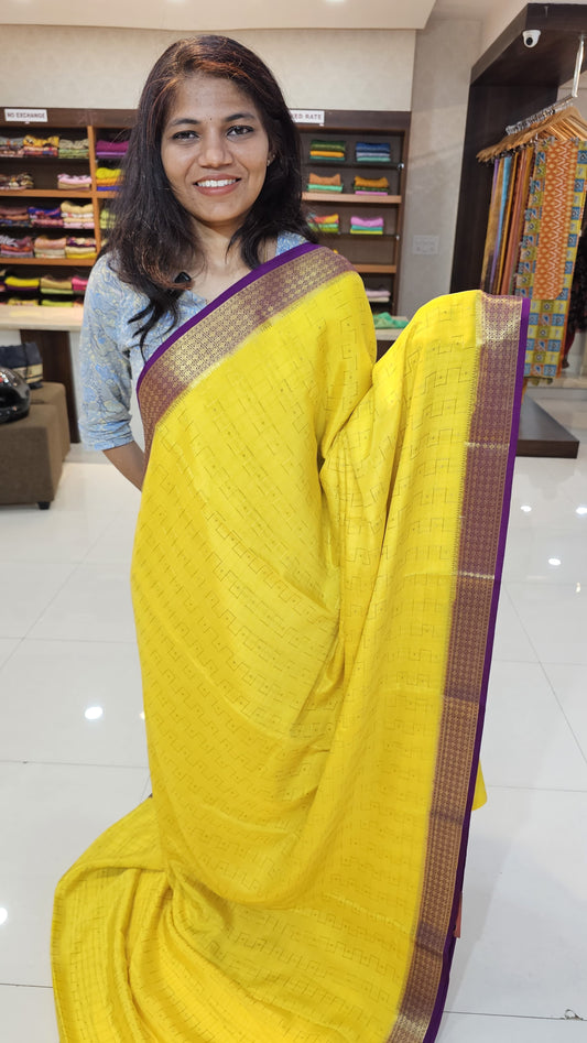 Mysore crepe silk saree with KSIC Finish in yellow with purple in zig zag pattern