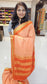 Mysore crepe silk saree with KSIC Finish in peach with orange in allover buttas pattern